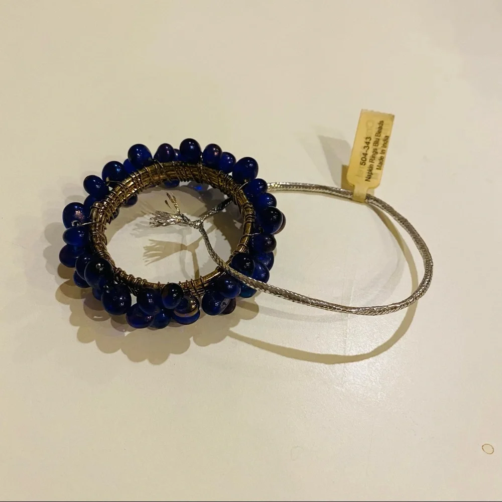 NWT Crate & Barrel 4 Napkin Rings.Blu Iridescent Beads.Great for casual or party